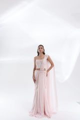 DEEPANSHI MASSEY LABEL baby pink pearl-embellished saree lehenga with strapless blouse and long draped pallu, full-length front view