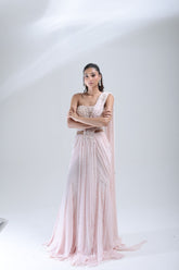 DEEPANSHI MASSEY LABEL baby pink pearl saree lehenga showing the full drape, embellished blouse and scattered pearl detailing